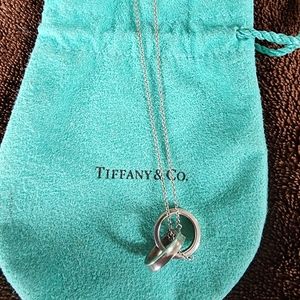 Tiffanys authentic 2 rings necklace . Like new.  Comes with dust bag